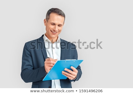 Foto stock: Businessman Holding A Clipboard