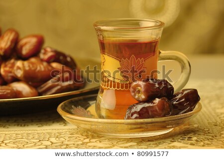 Сток-фото: Teacup With Sweet Dried Date
