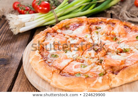 [[stock_photo]]: Tasty Homemade Seafood Pizza With Salmon