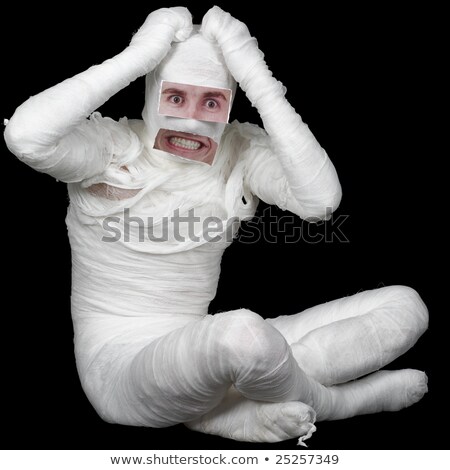 Man In Bandage With False Eyes And Mouth Stockfoto © pzAxe