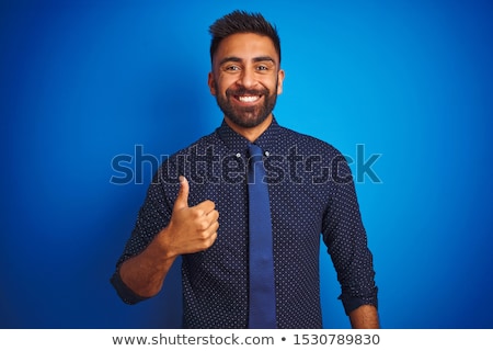 Foto stock: Confident Businessman Doing A Thumb Up