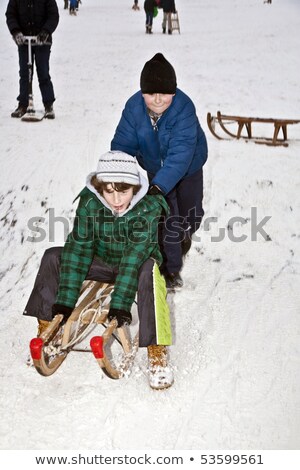 Zdjęcia stock: Children Are Skating At A Toboggan Run