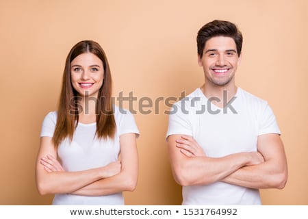 Stockfoto: Close Up Portrait Of Two Female Friends Wearing White Shirts