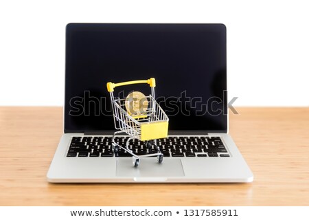 Foto stock: Cryptocurrency Bitcoin In Mini Supermarket Trolley On Laptop