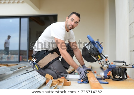 [[stock_photo]]: Man Using Circular Saw