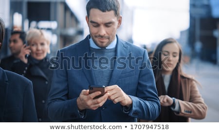 Сток-фото: Businessman Looking At His Phone