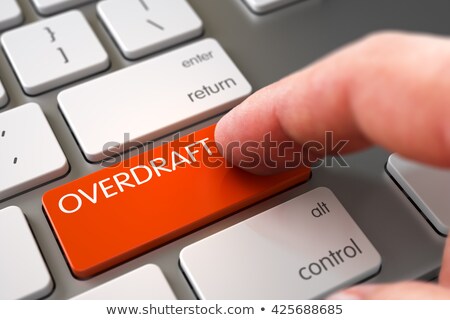 Keyboard With Overdraft Orange Button [[stock_photo]] © Tashatuvango