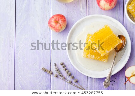 Foto stock: Honey Honeycombs And Fresh Apples Lavender