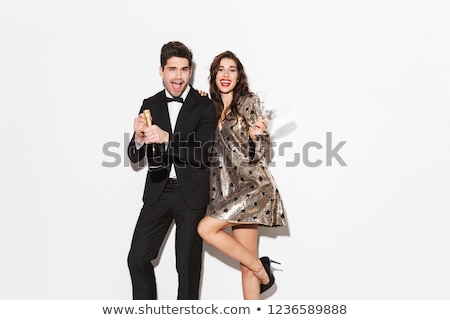 Stock photo: Cheerful Young Smartly Dressed Celebrating New Year