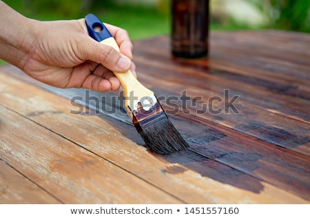 [[stock_photo]]: Carpenter Painting Wooden