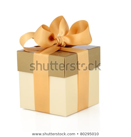 Foto stock: Gift Box In Gold Duo Tone With Golden Satin Ribbon And Bow Isolated Over White Background