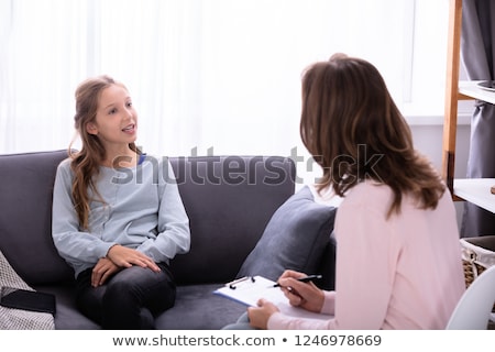 Сток-фото: Girl Explaining Her Problems To Psychiatrist