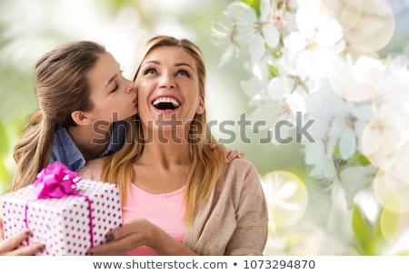 Foto stock: Mother And Daughter And Blossom Cherry