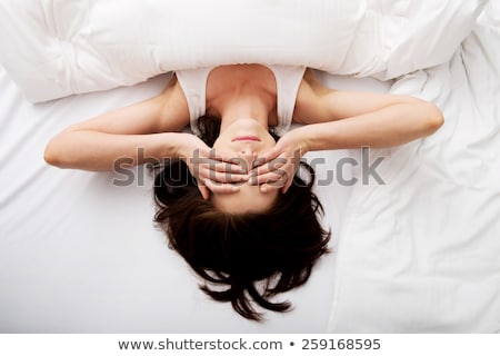 Stockfoto: Tired Woman In Bed