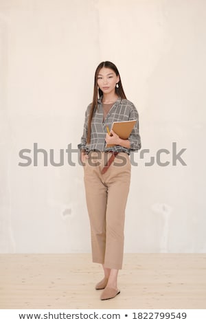 Portrait Of A Beautiful Young Businesswoman Looking At The Camer Stock photo © Pressmaster