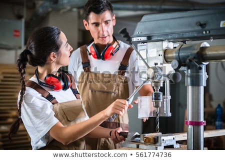 Man And Woman With Drills Foto d'archivio © Kzenon