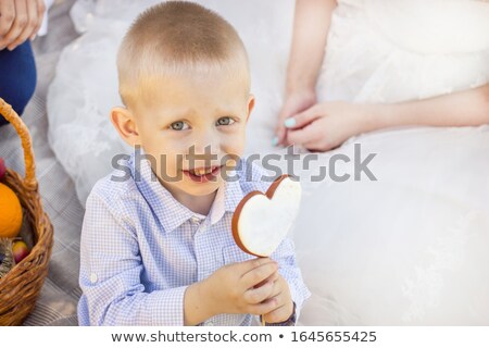 Stok fotoğraf: Portrait Of Boy Holding Hearts Shape In Basket