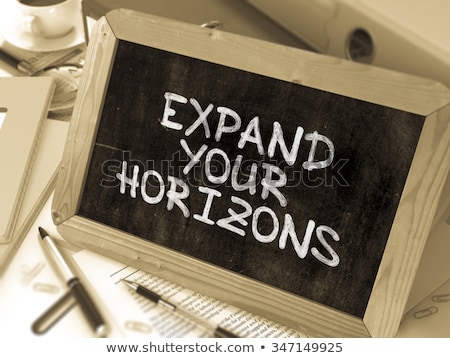 Сток-фото: Expand Your Horizons Motivation Quote A Blackboard