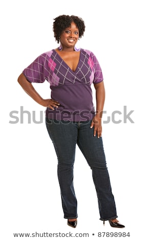 Foto d'archivio: Portrait Of Happy African Woman In Sweater And Jeans
