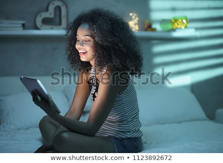 Stock fotó: Happy Black Woman Watching Comedy Show On Tv