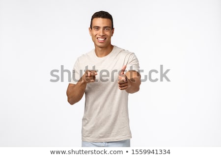 Сток-фото: Cheeky Friendly Handsome Musculine Young Tanned Strong Man Pointing Camera And Smiling Praise You