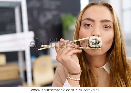 Stock photo: Japanese Mouth With Chopstick