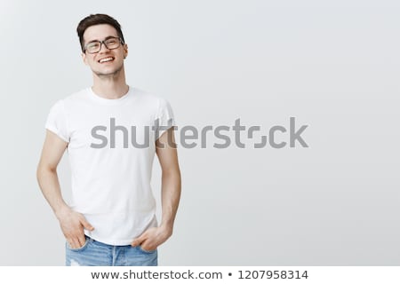 [[stock_photo]]: Young Man With Glasses Gesturing With Hand