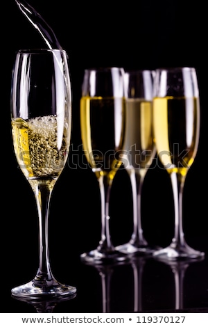 Stock fotó: Champagne Being Filled Into Glasses