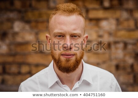 Foto stock: Young Man With A Long Red Beard