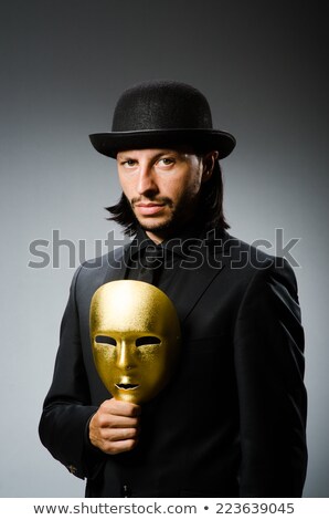 Stockfoto: Funny Concept With Theatrical Mask