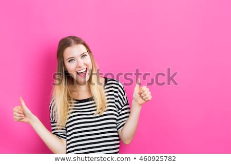 Stock photo: Woman Giving Thumbs Up Isolated On White