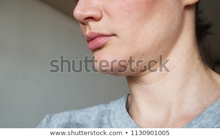 Foto stock: The Close Up Of A Young Womans Neck