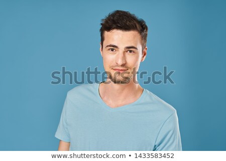 ストックフォト: Portrait Of A Young Bearded Man With Backpack