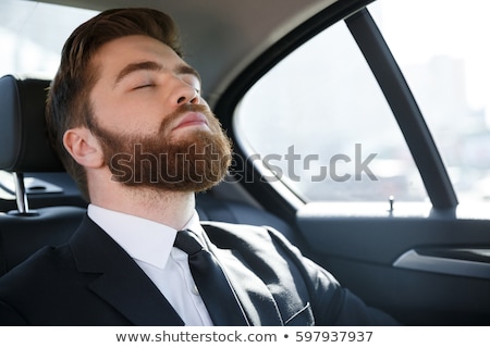 Сток-фото: Close Up Portrait Of A Tired Young Businessman