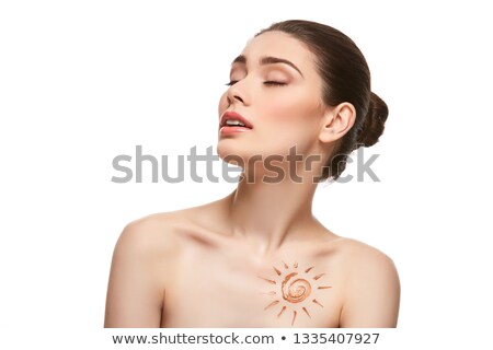 Foto d'archivio: Girl With Sun Drawing On Forehead Isolated On White