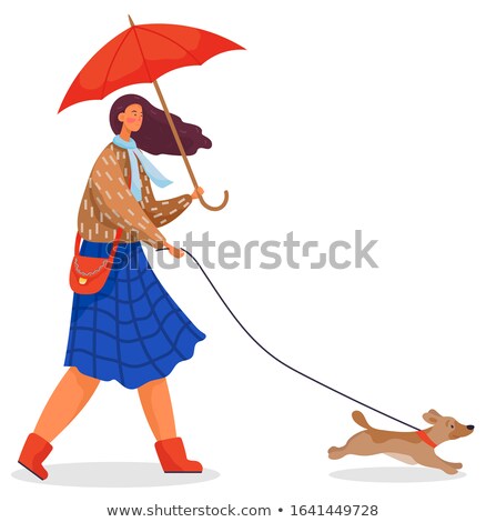 Femeie tânără în aer liber în câine de peisaj de toamnă Imagine de stoc © robuart