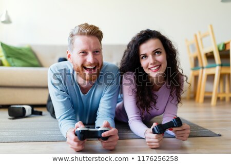 Stock fotó: Girl Playing With Console