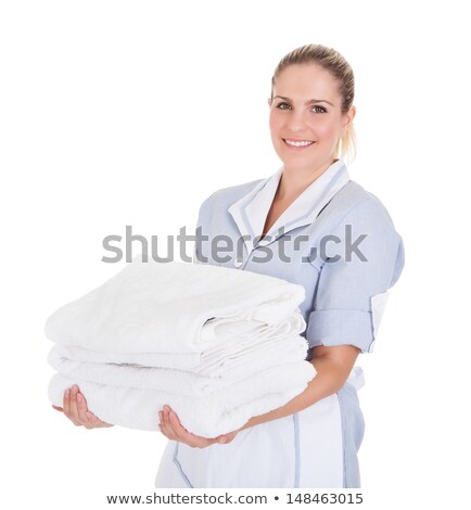 Foto stock: Happy Woman With Stack Of White Towels