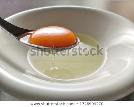 Stok fotoğraf: Yolk In The Spoon