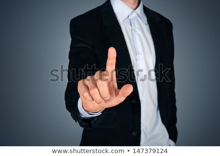 Сток-фото: Pensive Businessman Touching A Blank Invisible Screen