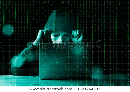 Foto stock: Anonymous Hacker In Glowing Computer Interface