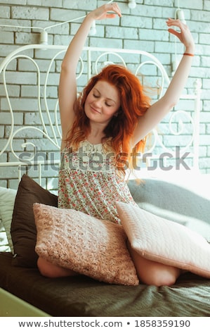 Stock fotó: Attractive Red Haired Female Stretching In Her Bed