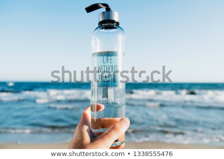 Plastic Bottle And Glass Of Water Foto stock © nito
