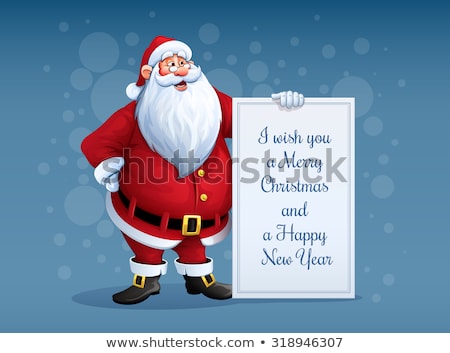 Foto d'archivio: Merry Santa Claus Standing With Christmas Greetings Banner In Arm