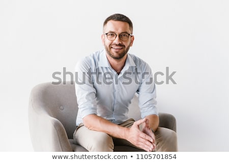 Foto stock: Serious Businessman Sitting On Chair