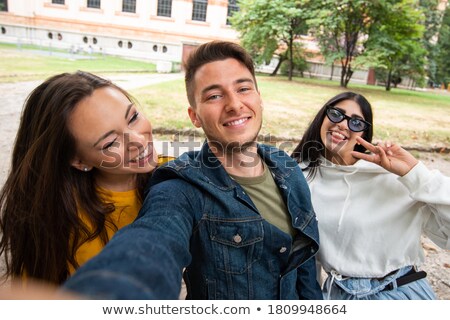 Stock foto: Happy Teenage Students Taking Selfie By Smartphone