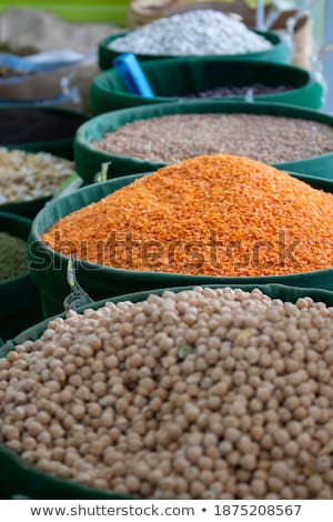 Stock foto: Sacks With Red Goji Buckwheat Jerusalem Pea Mulberry Kidney Bean Isolated Over Grey Background W