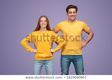 Сток-фото: Young Fitness Couple Wearing Jeans In The Studio