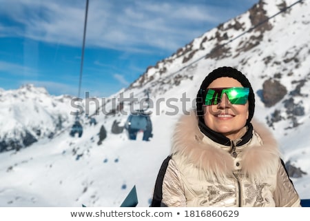 ストックフォト: Beautiful Woman In Sunglasses In Elevator