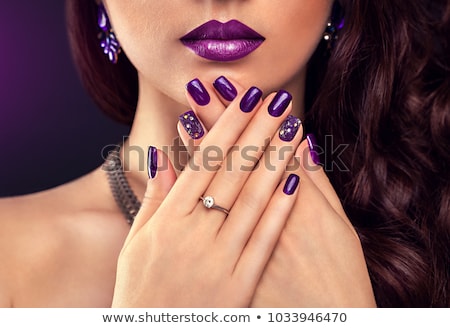 Stock photo: Woman With Purple Cocktail Ring